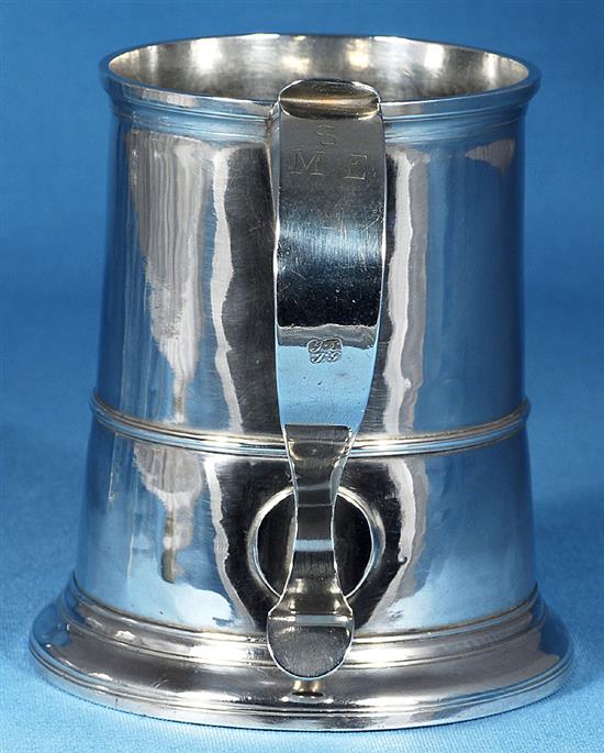 A George II provincial silver mug, height 143mm, weight 13.3oz/416grms.